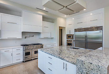 A beautifully remodeled kitchen with modern design elements.